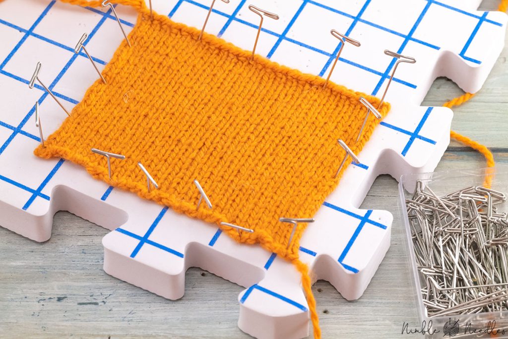 blocking the swatch on a blocking mat