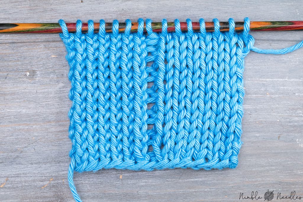 a swatch with normal stitches on the left and twisted stitches on the right side (as seen from the knit side)