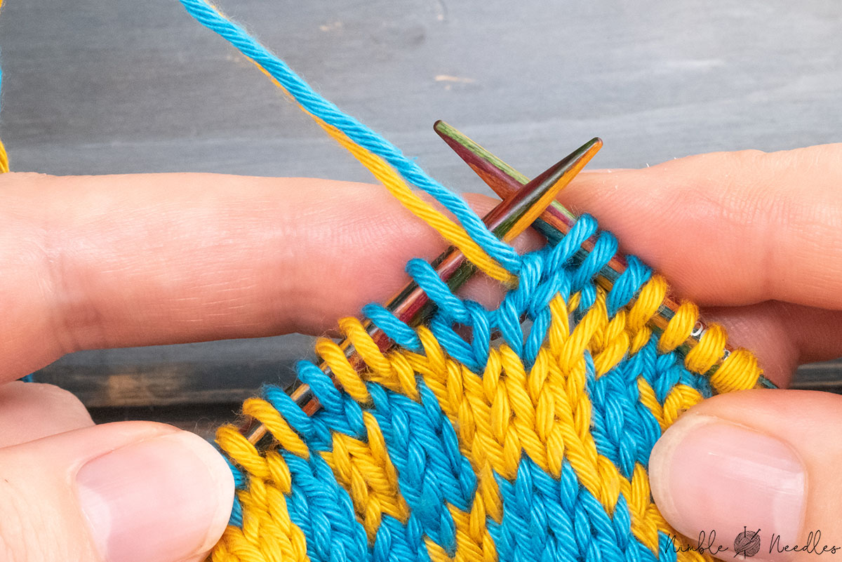 bringing both yarns to the front