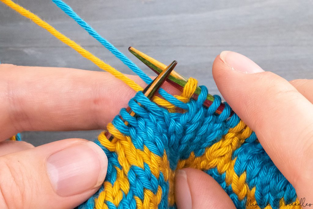 bringing both yarn to the back again