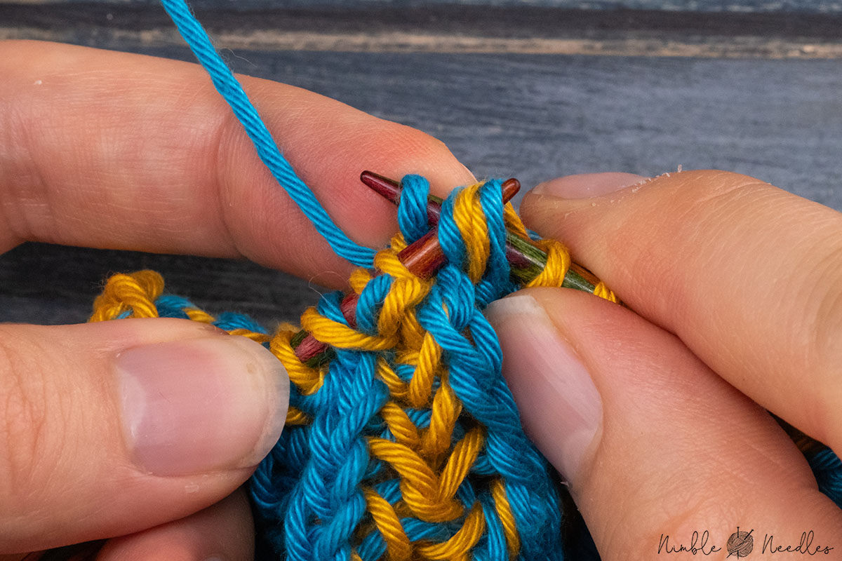 passing over the two double stitches