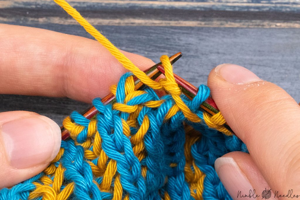 slipping back one purl stitch