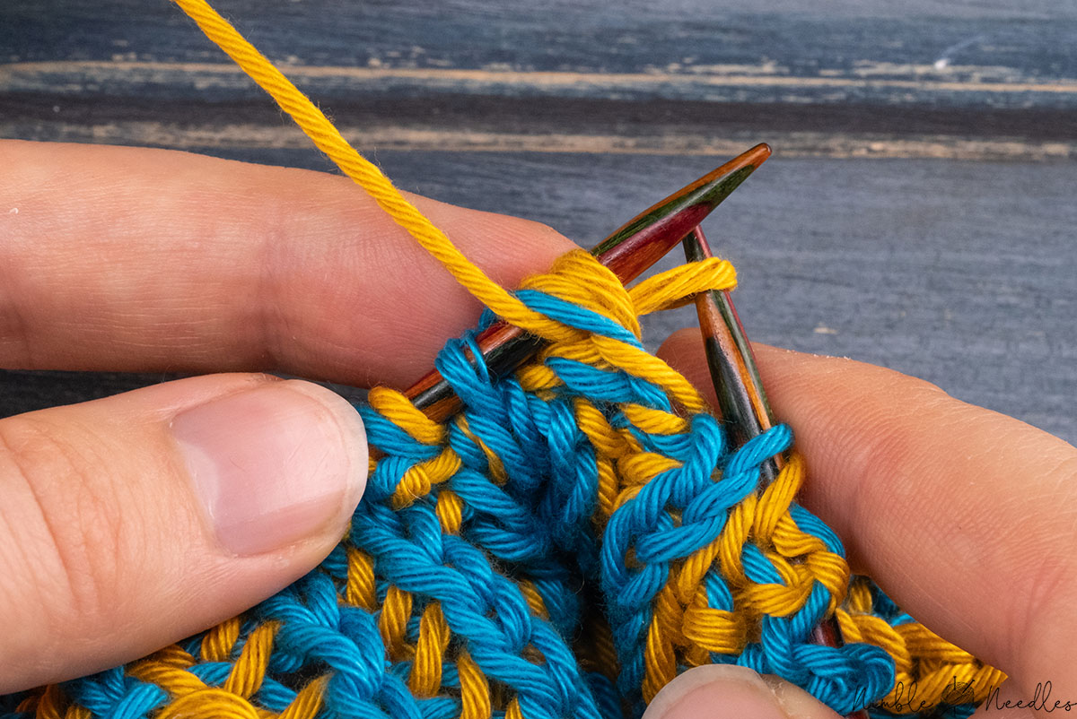 purling two double stitches together