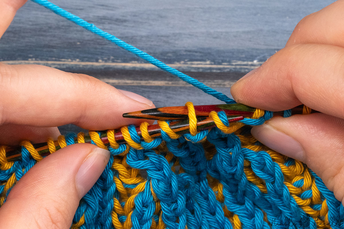 inserting the right needle into the second stitch from the back