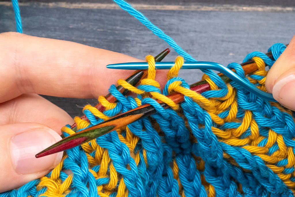 slipping two single stitches to a cable needle
