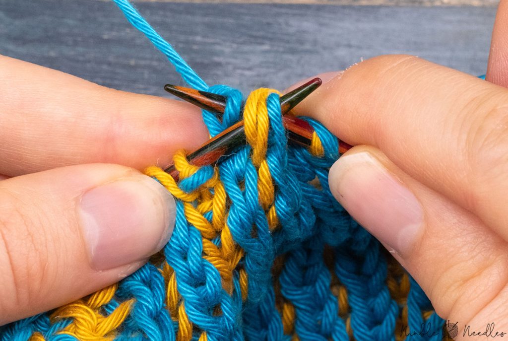 passing over two stitches