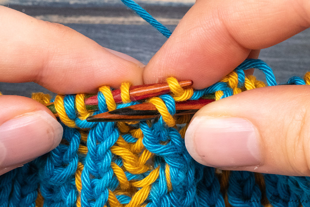picking the dropped stitch up right away