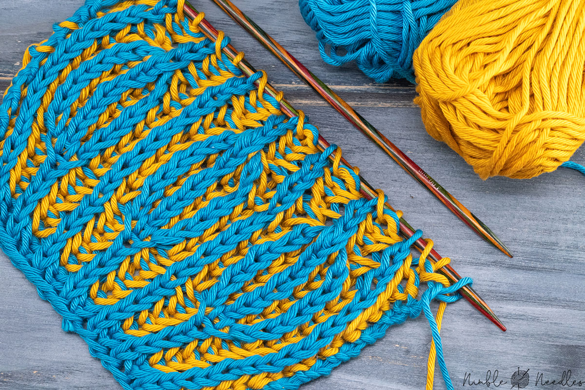 a swatch with reversible brioche double decreases on a table