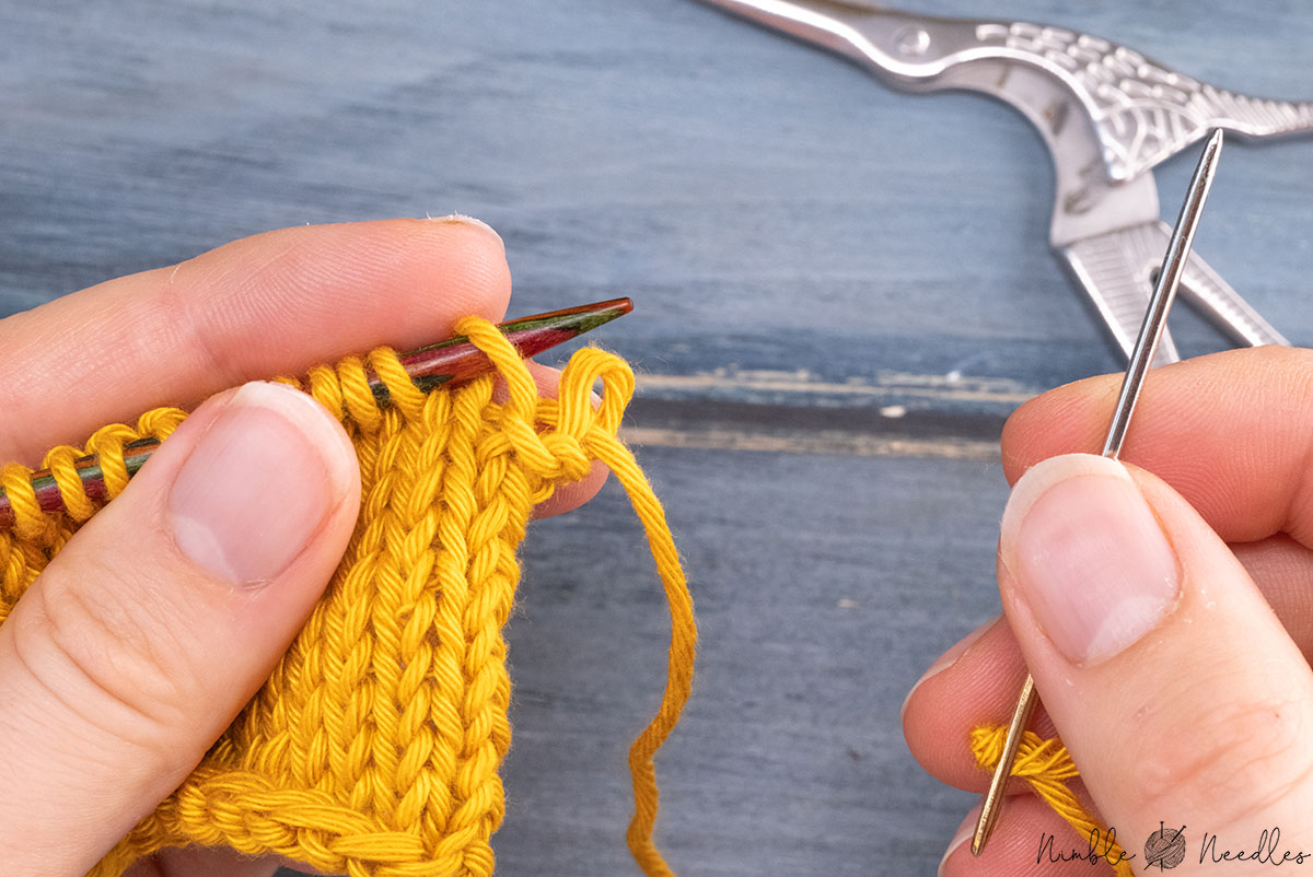 dropping the first stitch off the knitting needle