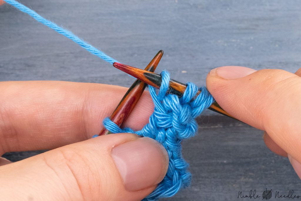 dropping the remaining loops of the left needle