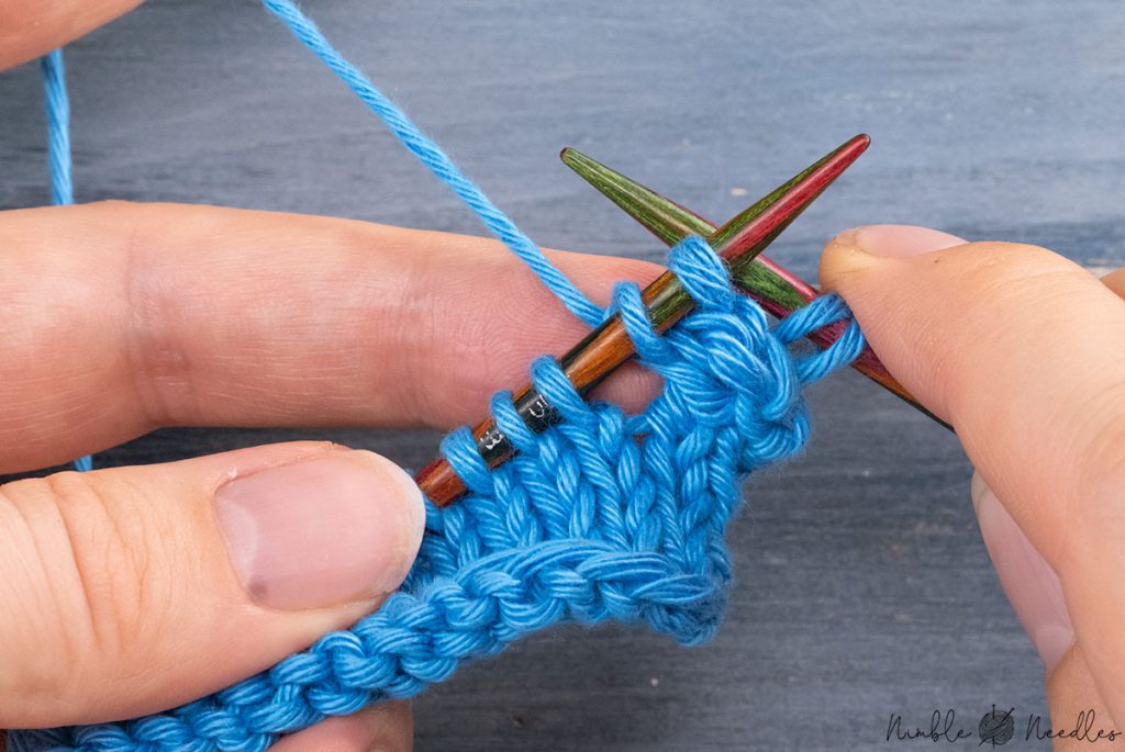 slipping back two stitches to the left needle