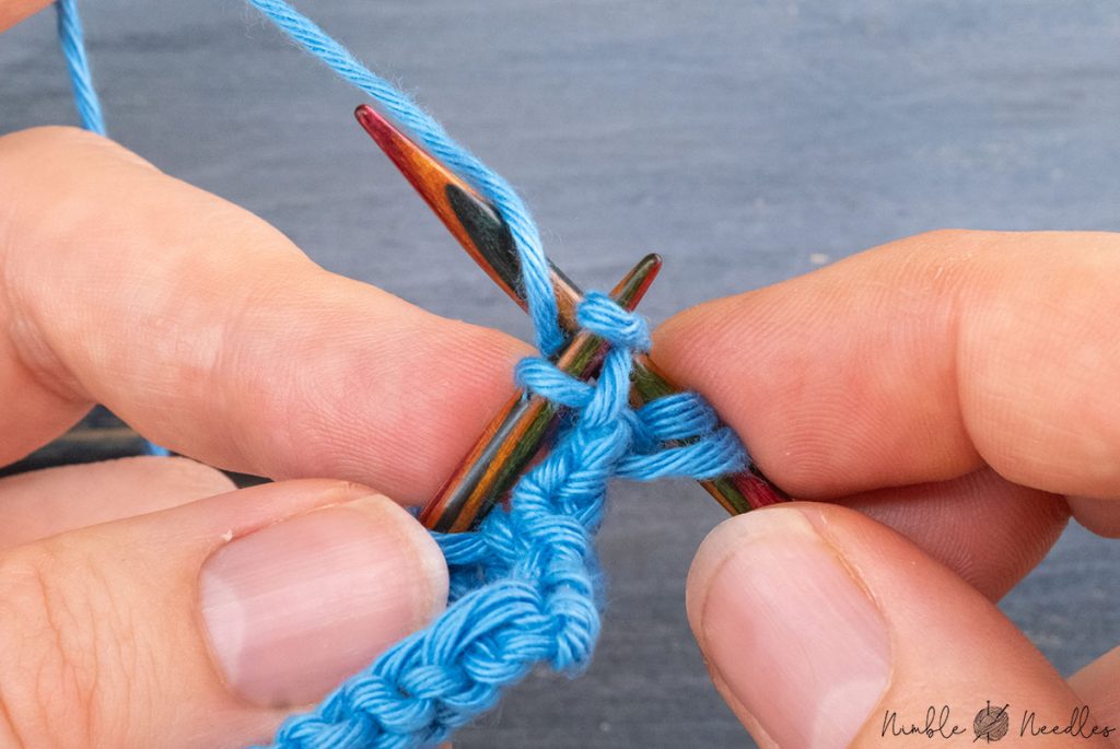 knitting into the new first stitch on the left needle