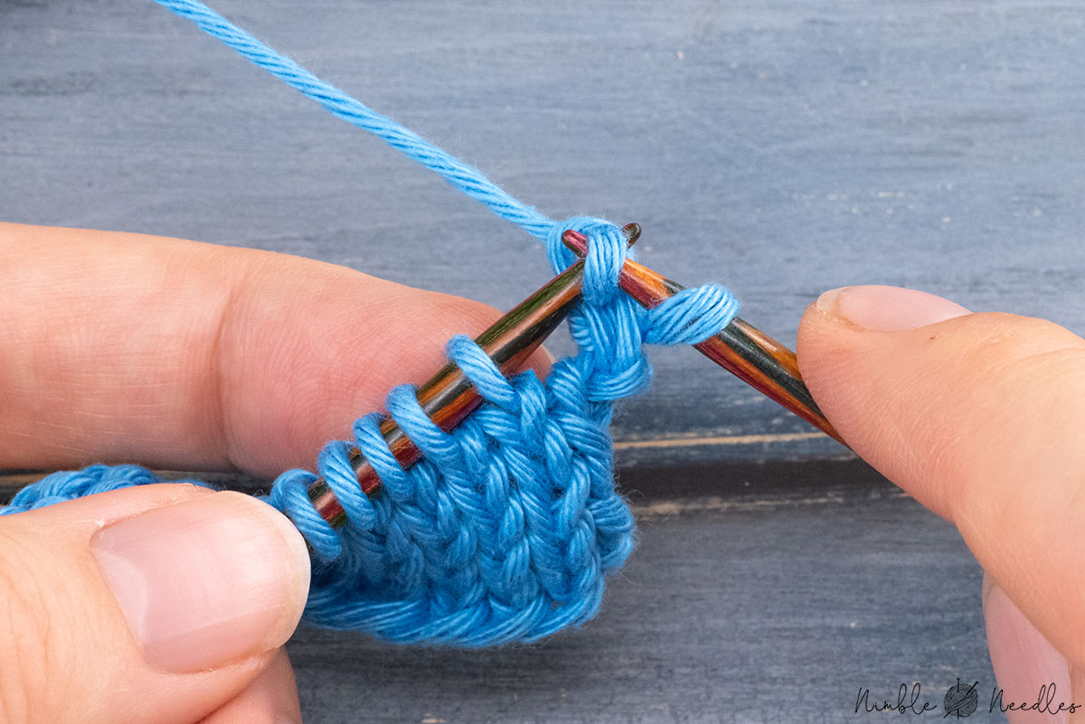 slipping back one stitch purlwise to the left needle