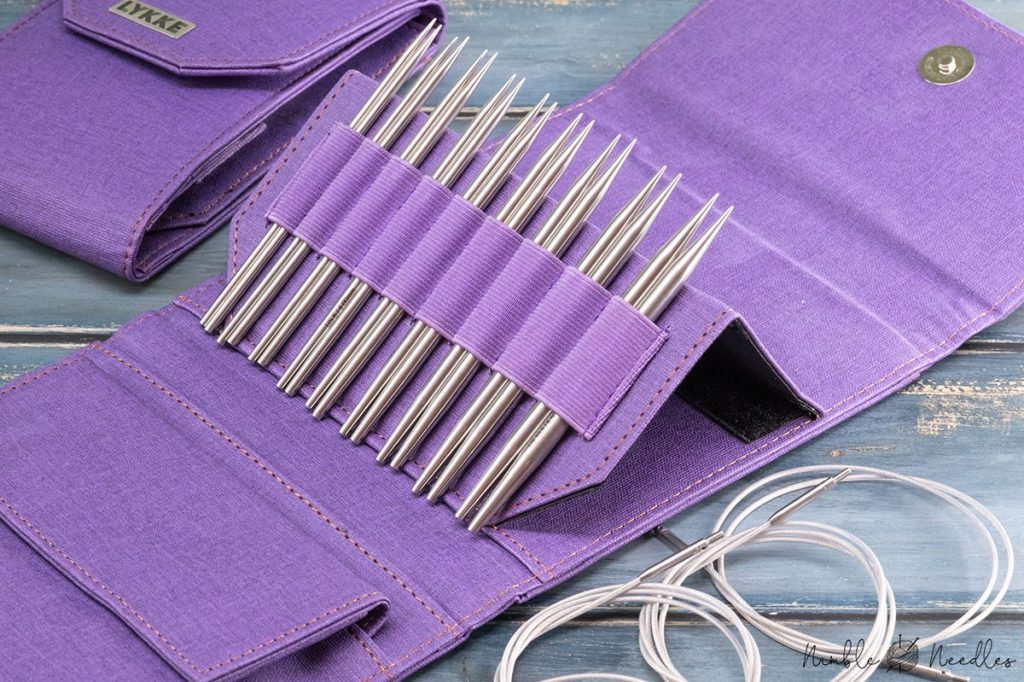 inside the set. a velcro can be used to prop the needles up for easier accessability